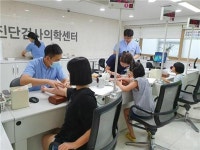 건협 부산검진센터, 나눔터지역아동센터 사회공헌 건강검진 실시