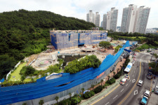 옛 미월드 땅 호텔 사업, 롤러코스터 타다 다시 파란불