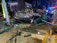 아기 태운 SUV, 경찰차와 충돌 후 인도로 전복…보행자·운전자 숨져