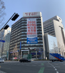 양재생 회장, 은산빌딩 2곳에 부산박람회 유치 홍보 현수막 게시