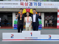 [포토뉴스]박홍식 명진학교장, 가이드로 장애학생체전 참가