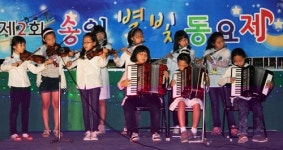 [시민기자] 꾀꼬리 선율 온동네 행복꽃…월성동 송일초교 별비치 동요제