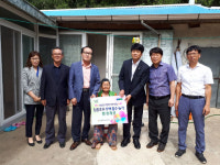 농협 폭우 피해 농가에 장판 지원