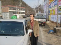 머리 깎아주는 ‘사랑의 택시기사’