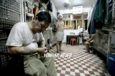 CHINA HONG KONG POVERTY HOUSING