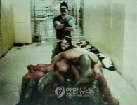 FILE IRAQ USA ABU GHRAIB PRISONERS ABUSE