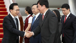 이 대통령, 정상회의 열리는 베이징 도착