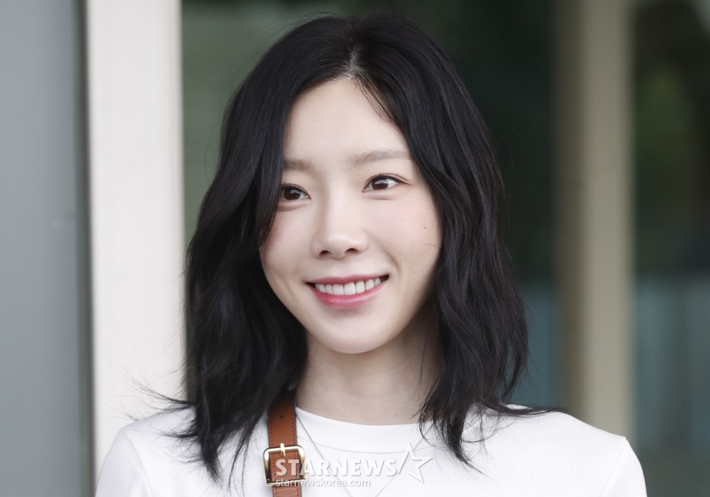 SM 엔터테인먼트 콘서트 불참 논란 속 태연·웬디, 소속사 갈등에 대처 중.