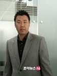 두산-소프트뱅크의 우호관계, 이범호는 꽃미소