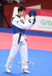 [MD포토] 남자 태권도 김태훈 금빛 미소