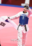 [MD포토] 여자태권도 이다빈 금빛 미소로 인사