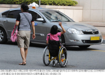 “장애인 콜택시， 기다리다 보면 날 새요”