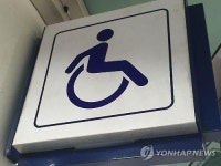 전동휠체어 타고 차량에 쿵…1천만원 챙긴 장애인