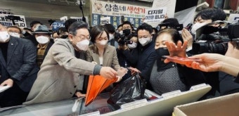 [포토] 이재명 후보, 목포 시장에서 ‘싱싱한 회’ 구매