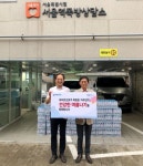 하이트진로, 쪽방촌 거주민에 석수 6만4000병 지원