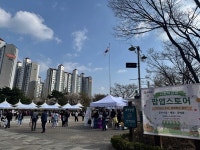 장자호수 벚꽃길 따라 열린 사회적경제 장터, 시민 발길 이어져