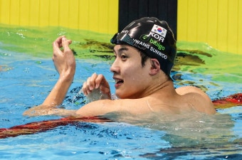 식중독 이겨내고 나란히 2관왕…황선우-김우민 MVP 레이스 '뜨겁다'