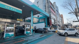 [르포] 100원 내리거나 영업 중단… 석유 최고가제 첫날, 주유소는 ‘제각각’