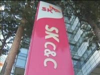 SK그룹 일감몰아주기 자진 축소…경제민주화 앞장 서나