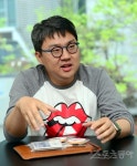 [김원겸의 엔터 파워맨] 김홍기 대표 “가수·작곡·작사가 우리가 연결”