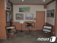 예산우체국 김동선 집배원의 고객 사랑 사진쉼터 눈길