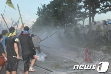 희망버스 죽봉들고 현대차 울산공장 진입시도