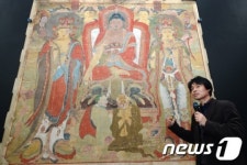 고국으로 돌아온 석가 삼존도