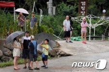 [화보]경북도 청도군 운문천 태풍 나크리로 야영객 고립