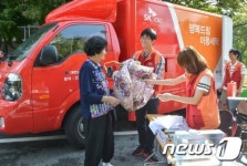 SK C&C, 성남시에 찾아가는  행복드림 세탁차량’ 기증