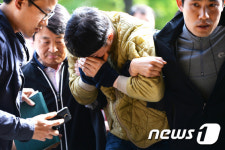 안산 토막살인사건 용의자 고개 숙인채...