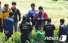 범행 상황 재연하는 중국인 살해범