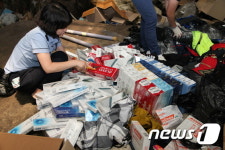 부산세관, 밀수입 담배·짝퉁물품 등 4000점 폐기