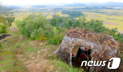 평화로운 들녘 속 초소, 남북관계 행방은?
