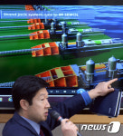 인양공정 변경 설명하는 장기욱 세월호인양과장