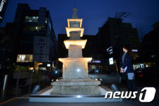 경매로 나온 삼층석탑 운반은 어떻게?