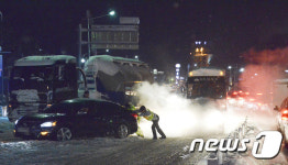7번국도 정체...힘껏 밀어라