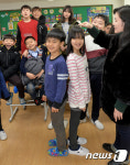 방학 사이 키가 많이 컸네