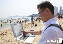 SK텔레콤, 해운대 피서객 논란 종지부 찍는다