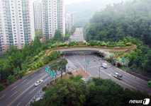 도로 개설로 끊긴 관악산 둘레길 호암로로  이었다