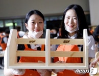 BGF리테일 상반기 공채 신입사원 연수…직접 조립한 가구 기부