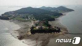 소달구지 어촌마을 서산 웅도,  전국 최고 어업공동체
