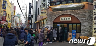 영화 극한직업 흥행에 수원 통닭거리가 뜬다