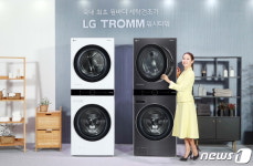 일체형 디자인의 원바디 세탁건조기 LG 트롬 워시타워