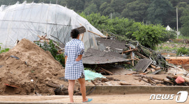 저수지 둑 붕괴, 물 6만톤이 마을 집어 삼키다
