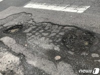 부산 폭우 후 도로 곳곳 파손·포트홀…운전자·보행자 큰 불편