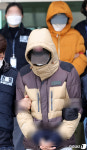 군산교도소로 이송되는 생후 2주 신생아 숨지게 한 20대 부부