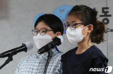 아동이 바라는 세상 발표하는 반규현·고보민 위원