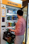 이마트24, 낮에는 냉장고 밤에는 주류자판기…AI 기반 제품 첫 선