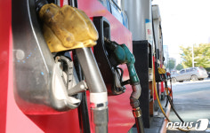 유류세 인하율 최대 15%, 빠르면 다음달 중순 시행