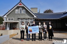 남도일보 역사소설 깃발 200권 광주 동구에 기증